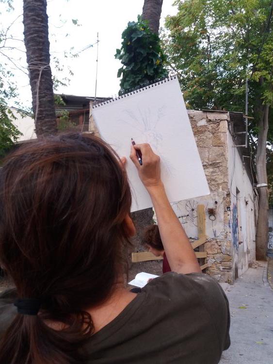 Fine art students of the University of Nicosia working in situ mapping the palm trees that appear in the same place today as on Kitchener's map.
